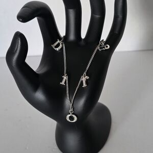 CHRISTIAN DIOR Women's Rhinestone Charm Adjustable Chain Silver Metal Bracelet